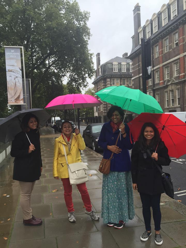 Happy visitors with colourful umbrellas. Copyright: Poulomi Das