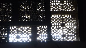 Detail of a carved window near the ceiling of the dome